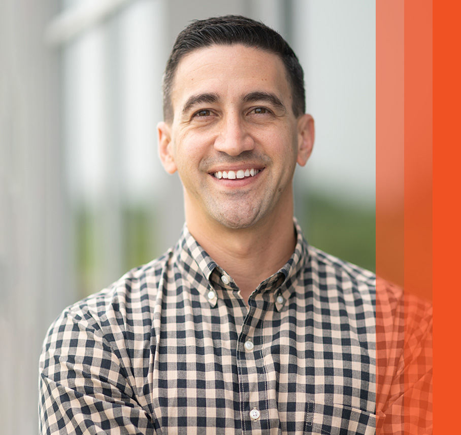 Laudi headshot with orange bars.