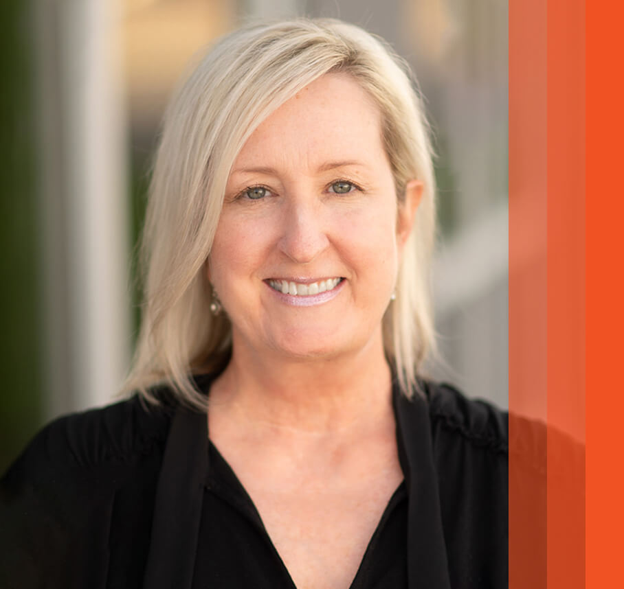 Cristy headshot with orange bars.