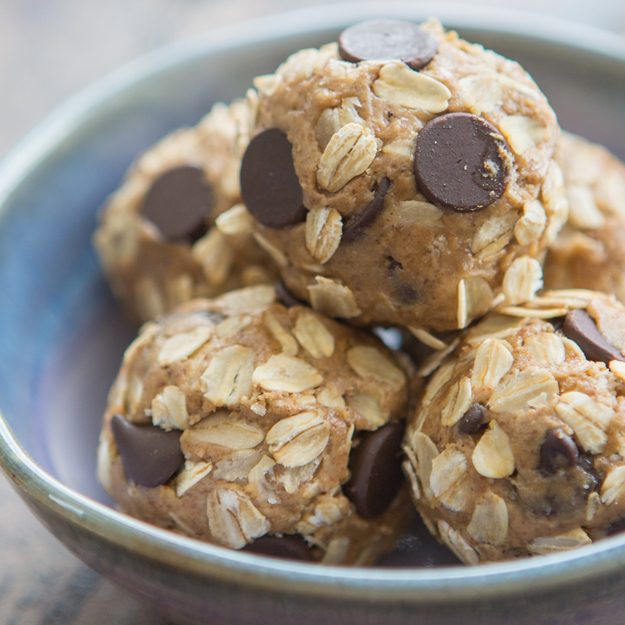 Oatmeal chocolate chip energy balls in a bowl.