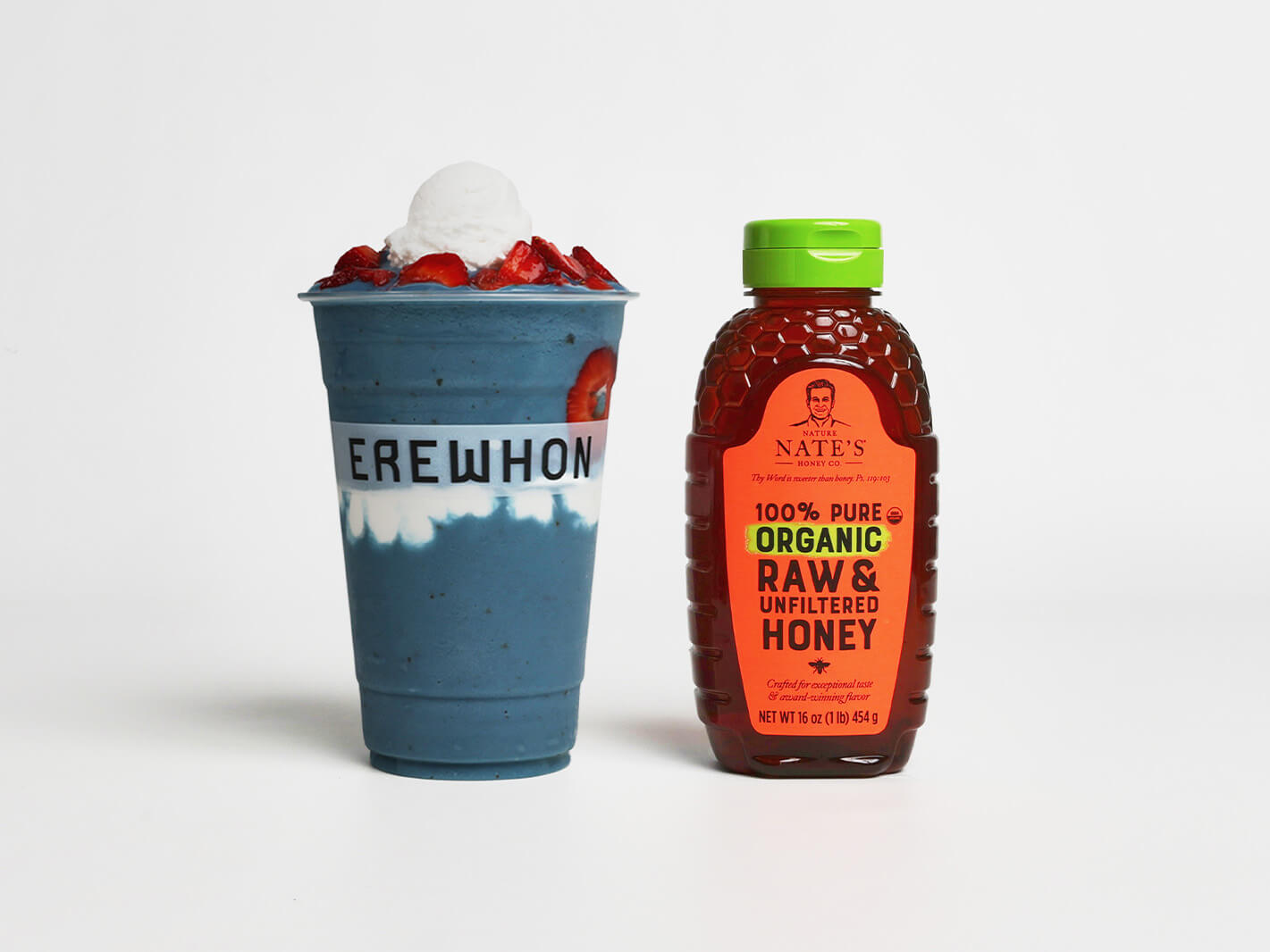 Erewhon smoothie and Nate's organic honey displayed next to each other upright.