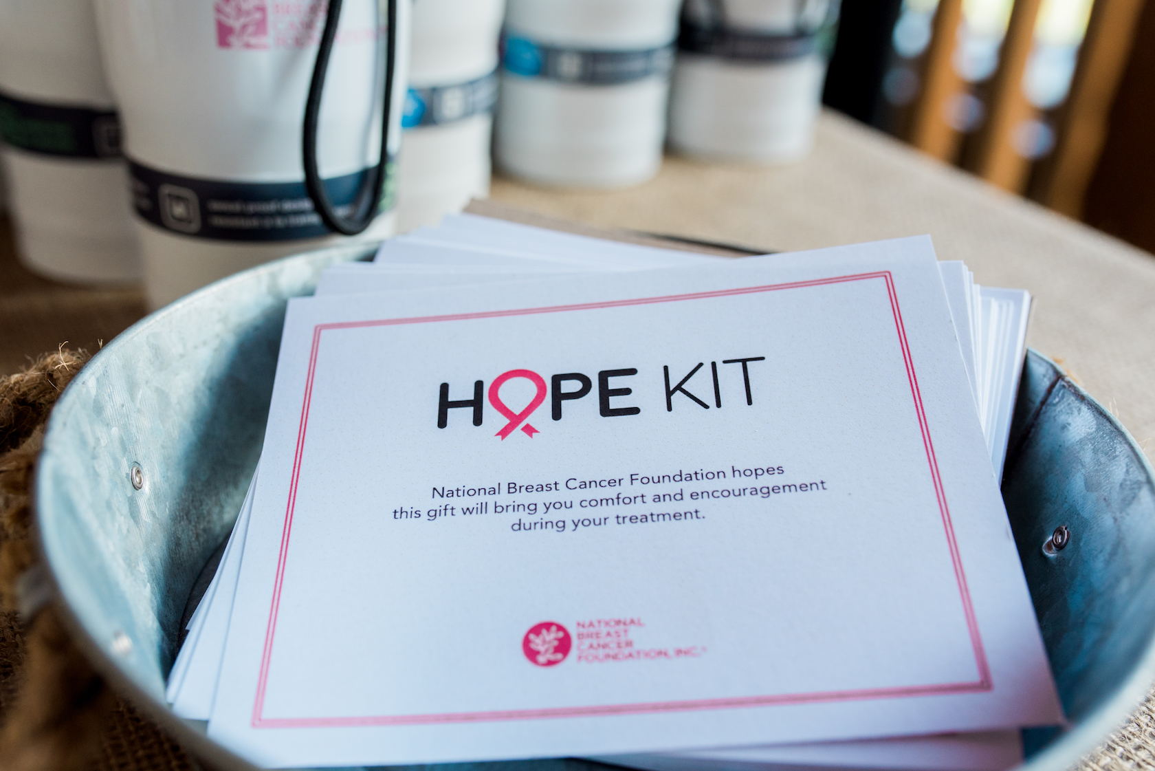Pamphlets reading HOPE KIT on a tray, with a message of encouragement for breast cancer treatment.