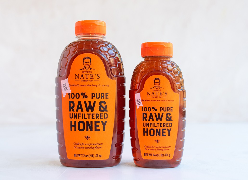 Front of 16 and 32-ounce bottle of Nature Nate's Raw & Unfiltered Honey
