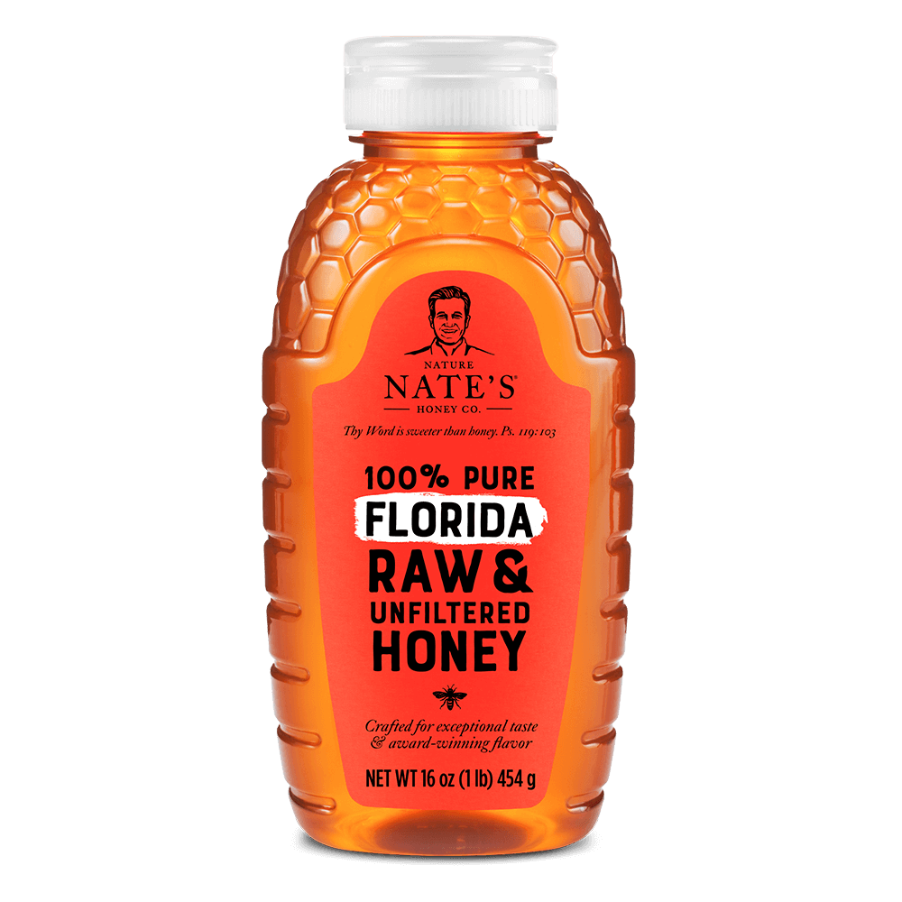 Nate's Florida raw and unfiltered honey bottle on white background.