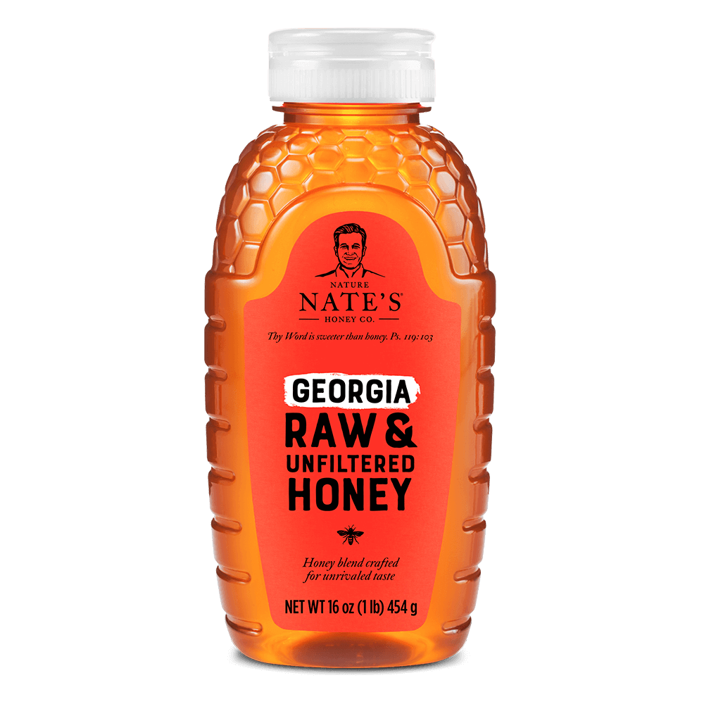 Nate's Georgia raw & unfiltered honey bottle on a white background.